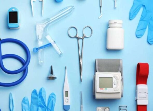 Flat lay composition with medical objects on color background